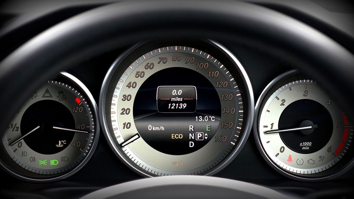 Close-up of a car's speedometer and instrument gauges